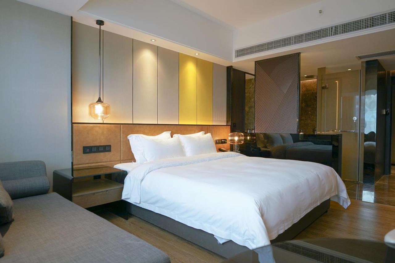 Paco Hotel Datang Metro Canton Extérieur photo