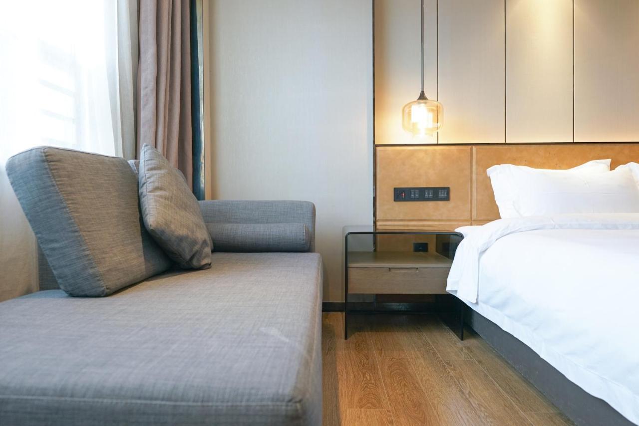 Paco Hotel Datang Metro Canton Extérieur photo