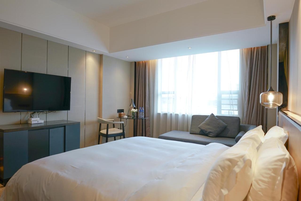 Paco Hotel Datang Metro Canton Extérieur photo