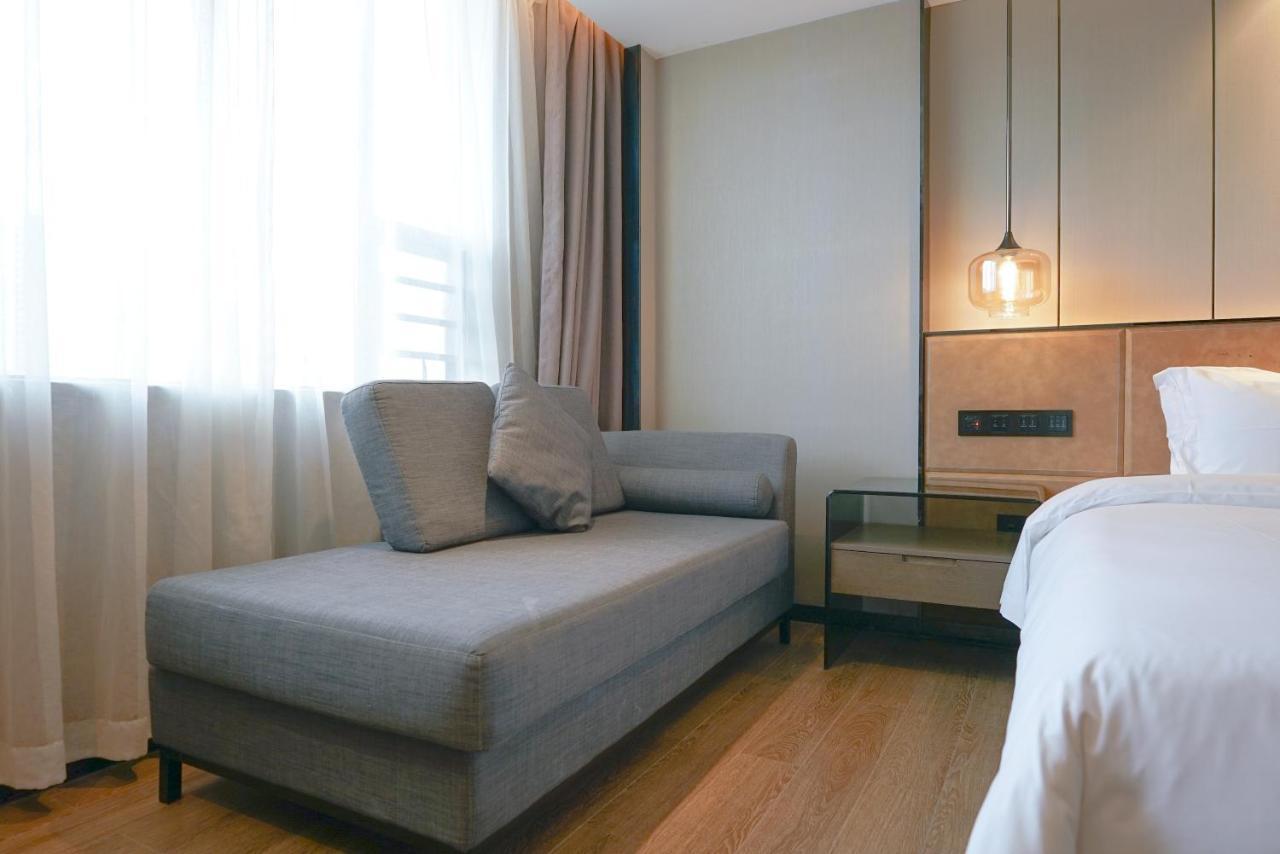 Paco Hotel Datang Metro Canton Extérieur photo