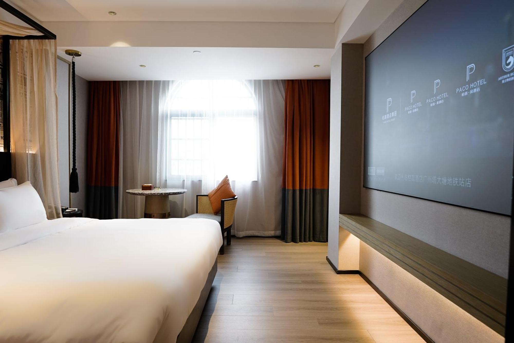 Paco Hotel Datang Metro Canton Extérieur photo