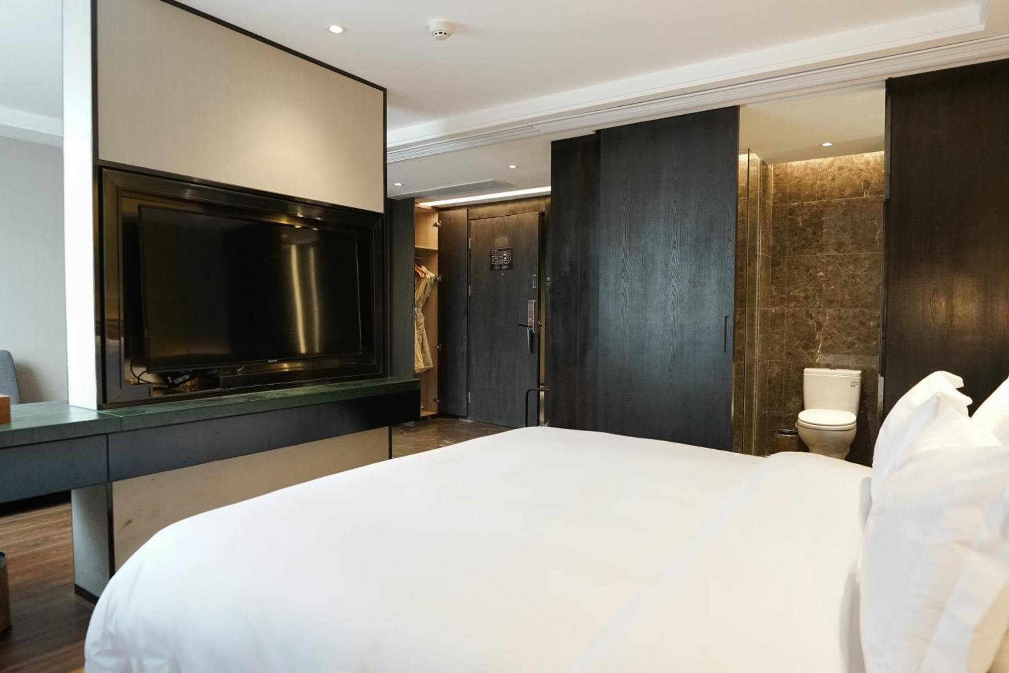 Paco Hotel Datang Metro Canton Extérieur photo