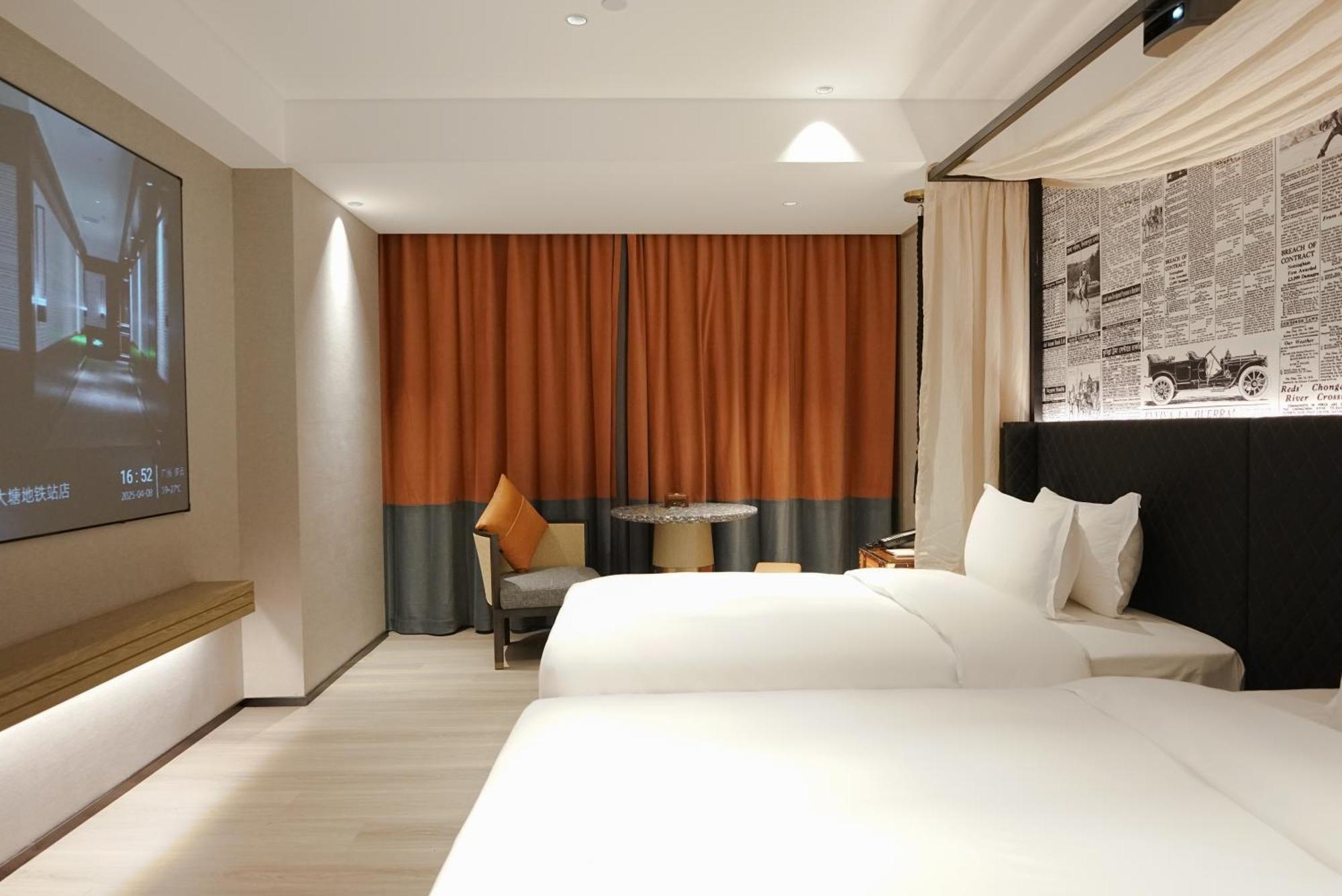Paco Hotel Datang Metro Canton Extérieur photo
