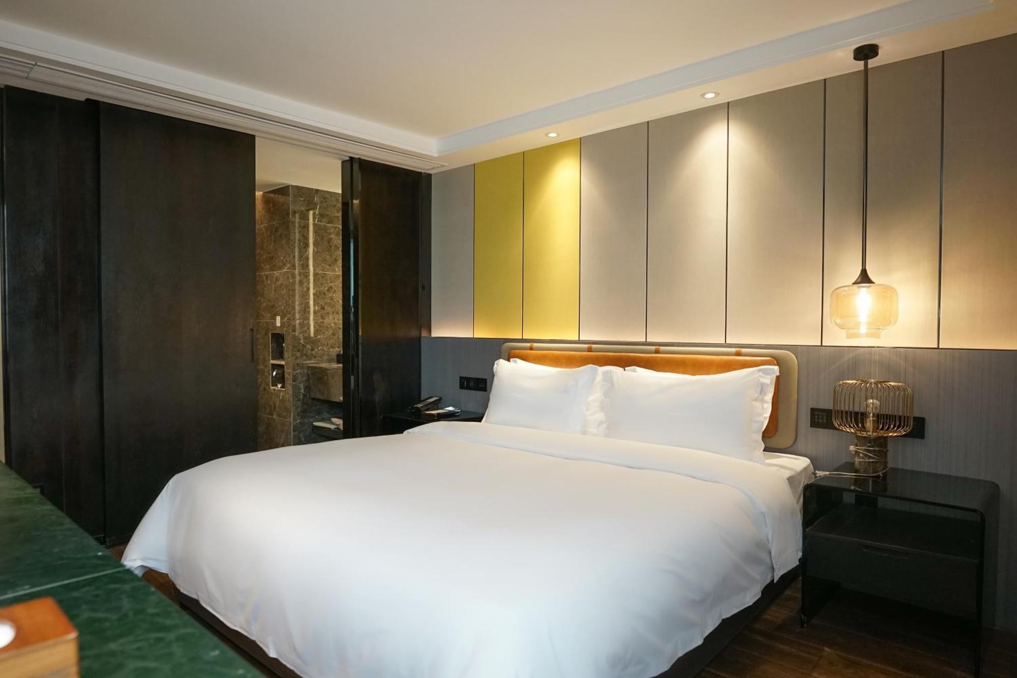 Paco Hotel Datang Metro Canton Extérieur photo