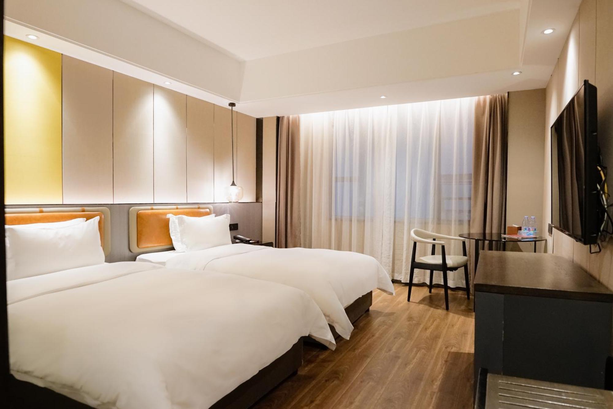 Paco Hotel Datang Metro Canton Extérieur photo