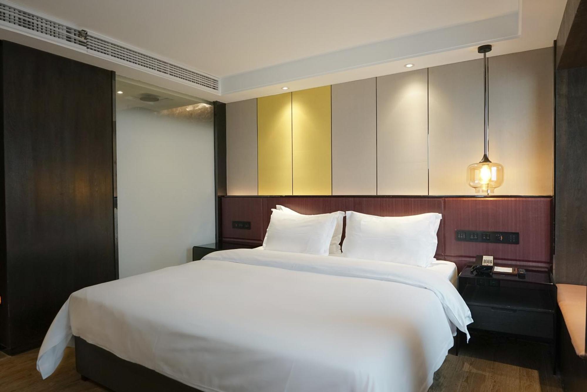Paco Hotel Datang Metro Canton Extérieur photo