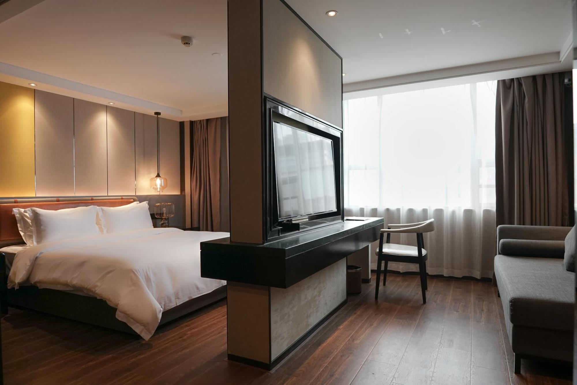Paco Hotel Datang Metro Canton Extérieur photo
