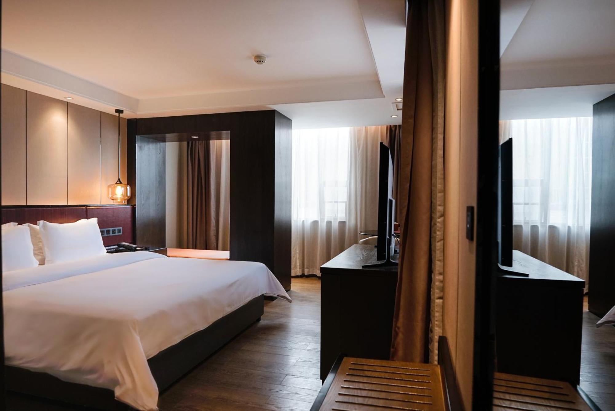Paco Hotel Datang Metro Canton Extérieur photo
