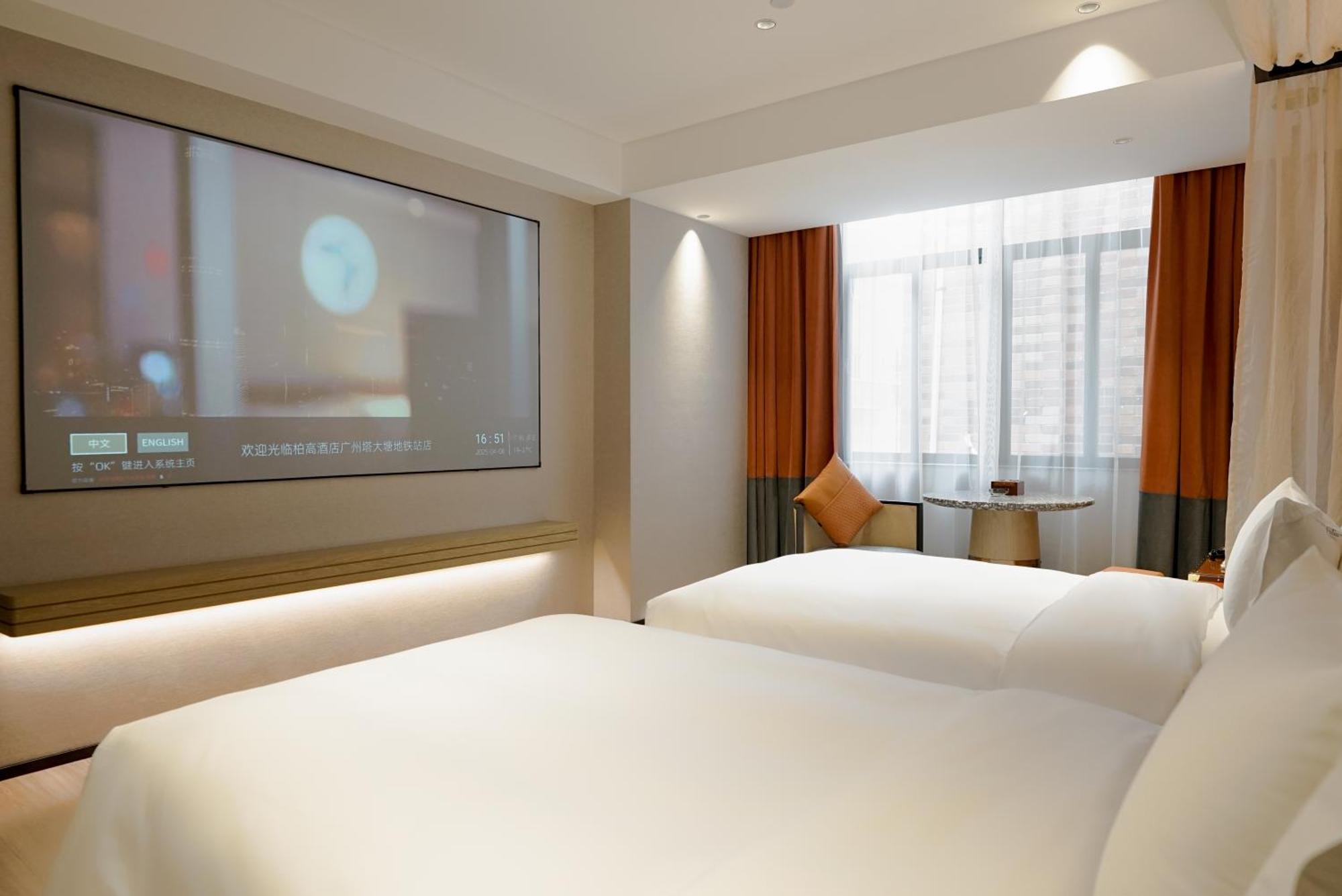 Paco Hotel Datang Metro Canton Extérieur photo