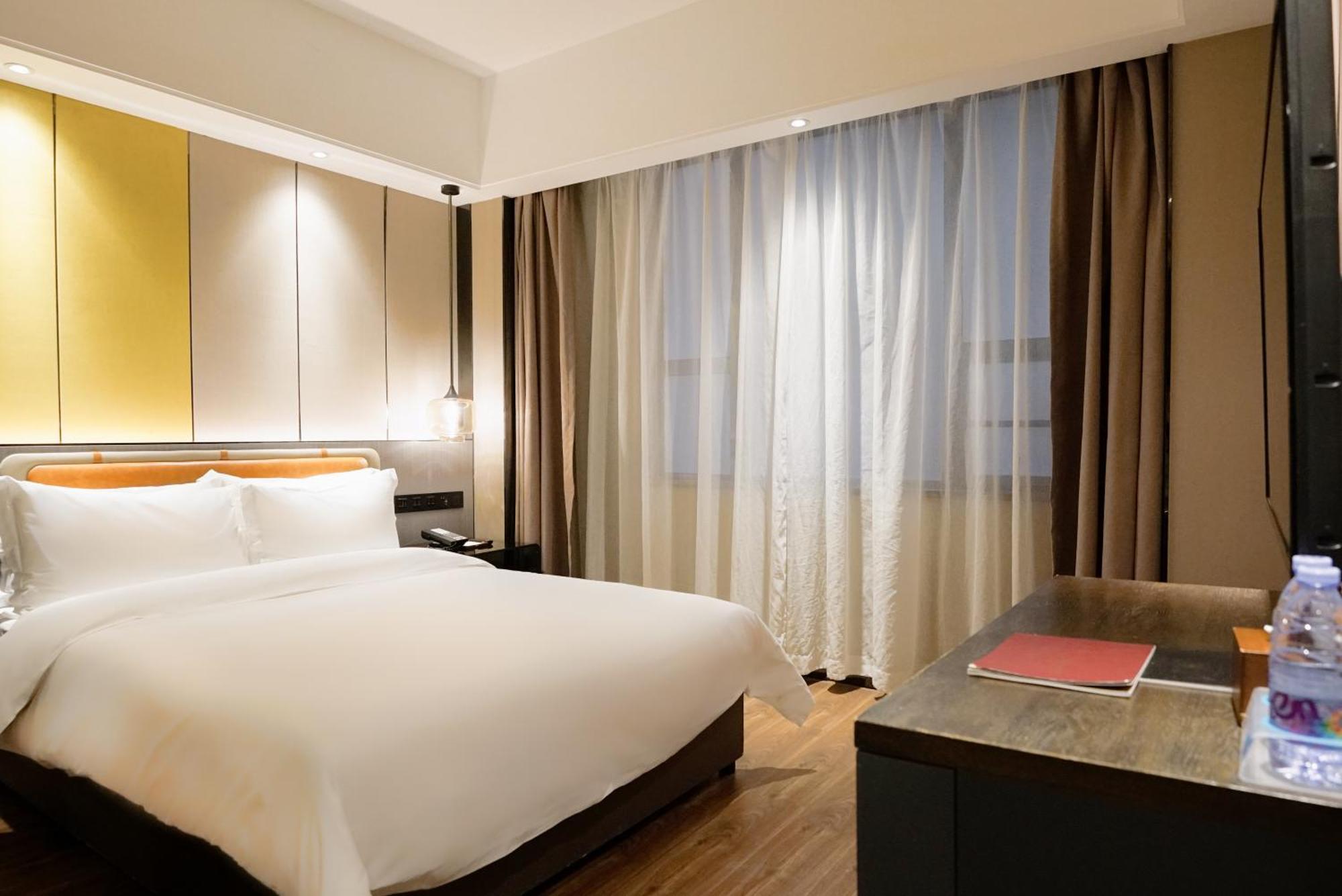 Paco Hotel Datang Metro Canton Extérieur photo