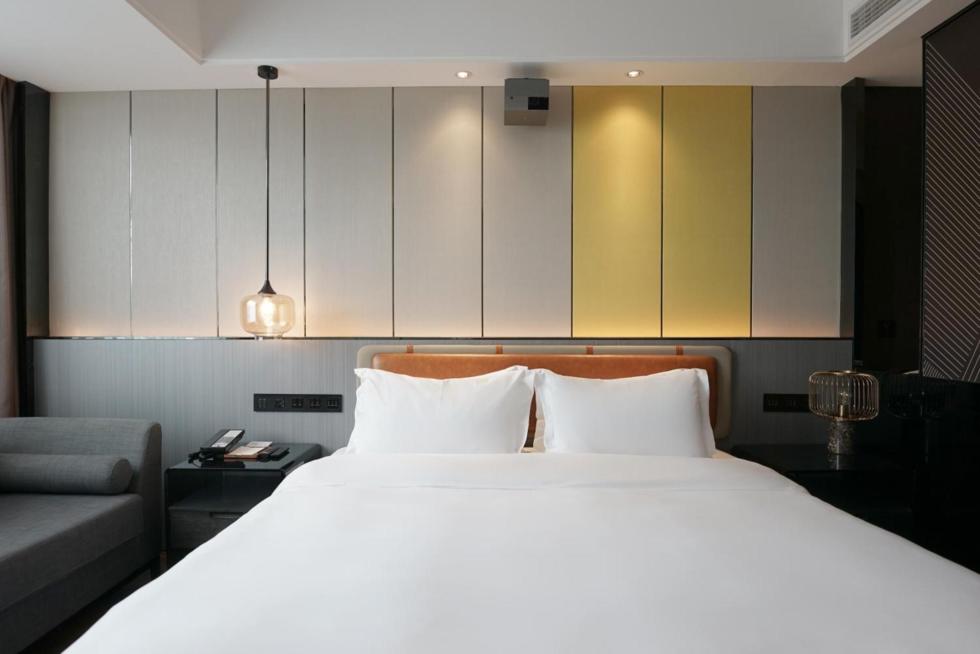 Paco Hotel Datang Metro Canton Extérieur photo