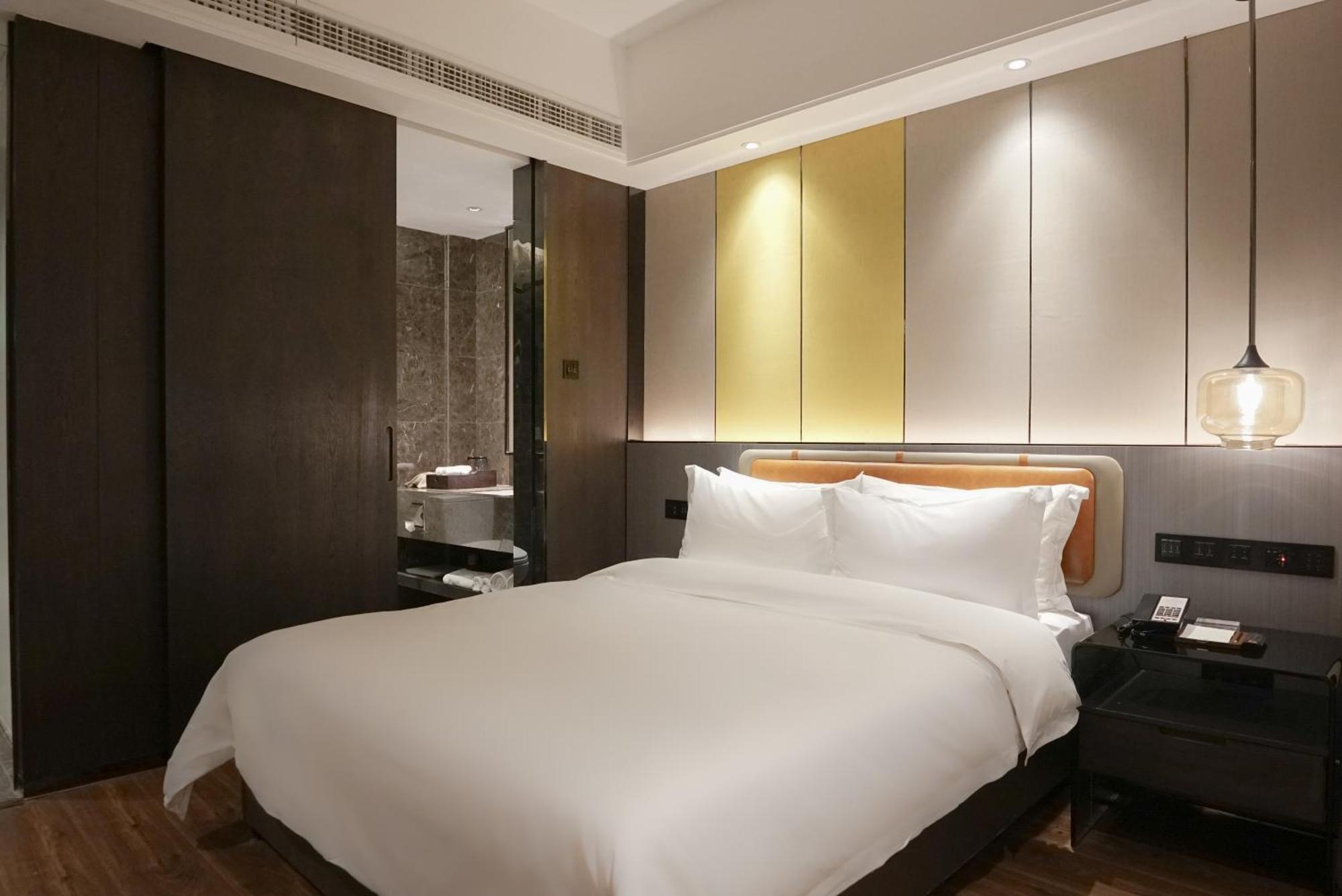 Paco Hotel Datang Metro Canton Extérieur photo