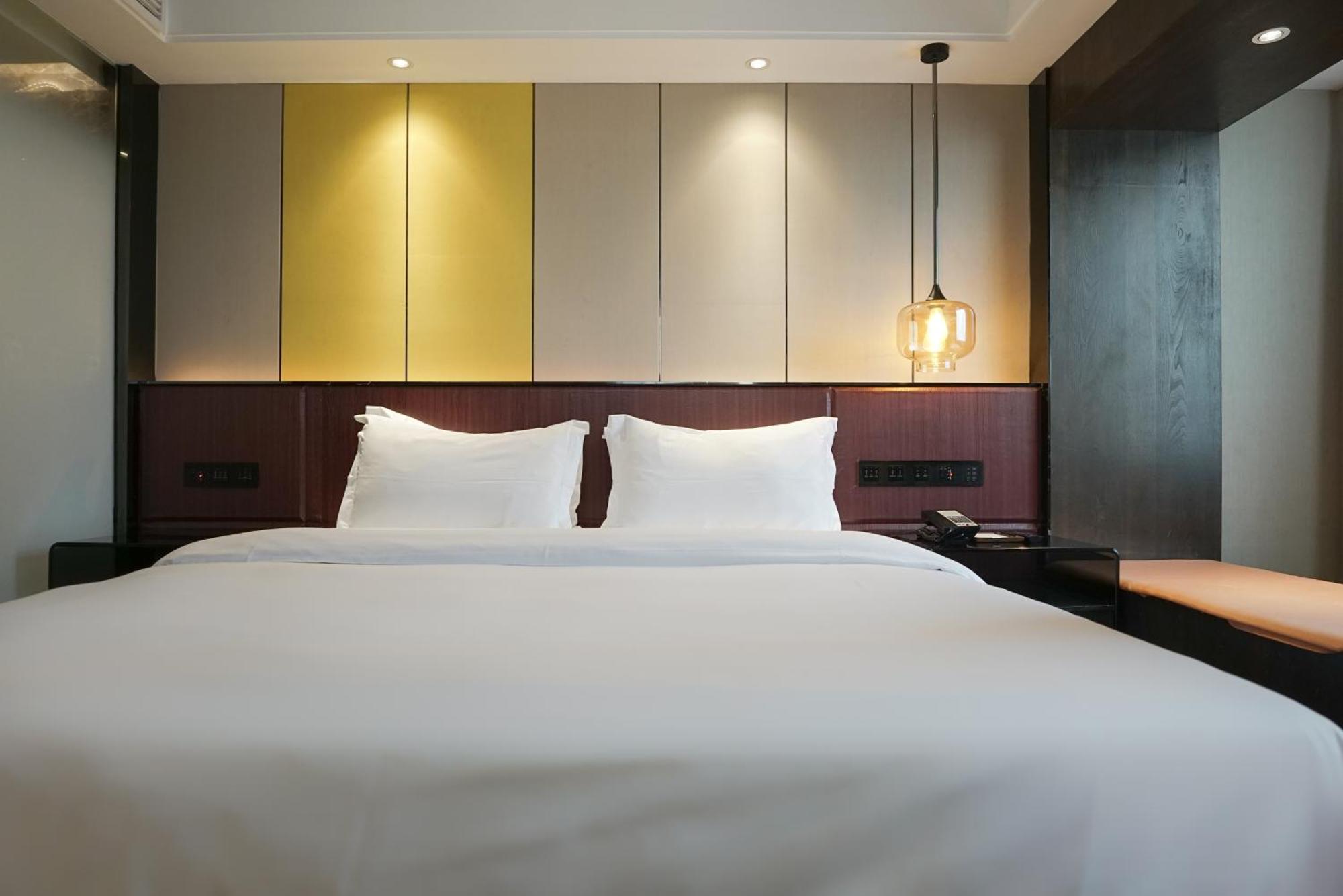 Paco Hotel Datang Metro Canton Extérieur photo