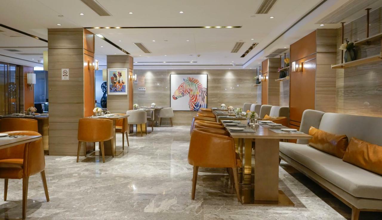 Paco Hotel Datang Metro Canton Extérieur photo