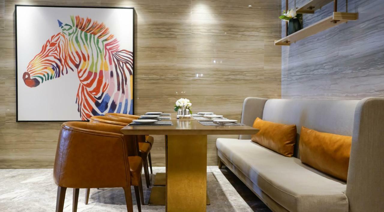 Paco Hotel Datang Metro Canton Extérieur photo