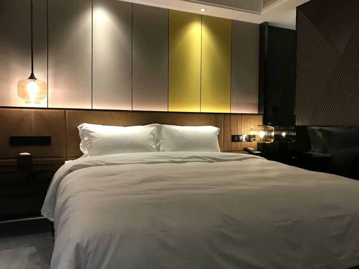 Paco Hotel Datang Metro Canton Extérieur photo